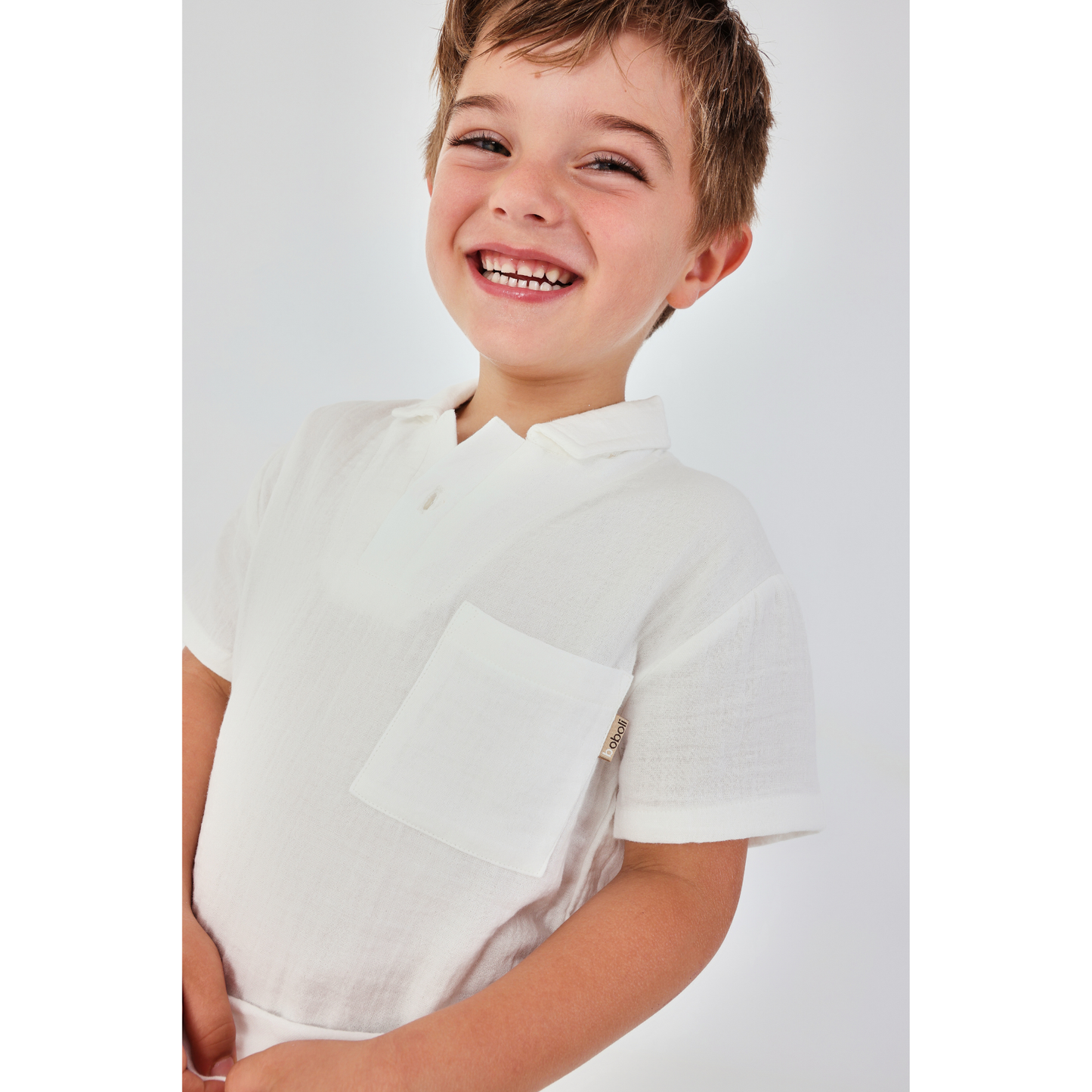 Polo infantil de algodão branco