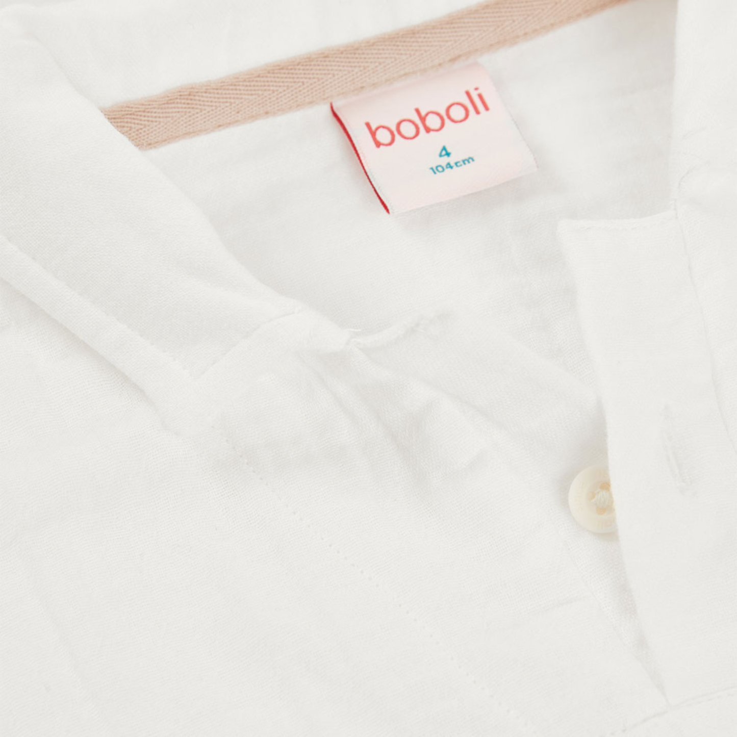 Polo infantil de algodão branco