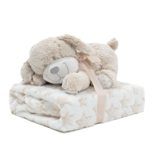 Cão de peluche com manta