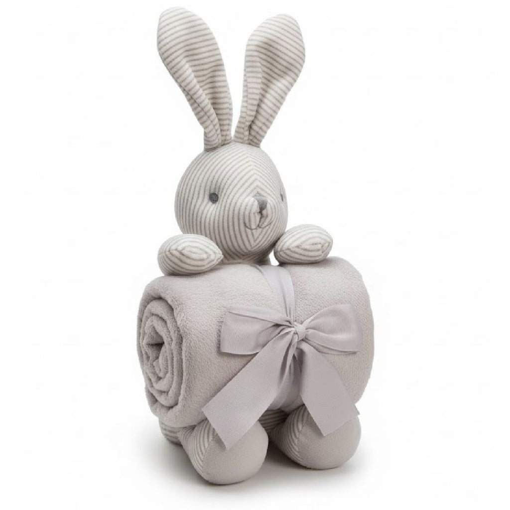 Coelho de peluche com manta